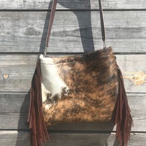 Brindle hair on cowhide purse